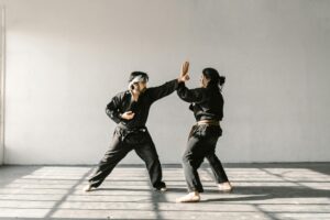 Men Practicing Taekwondo